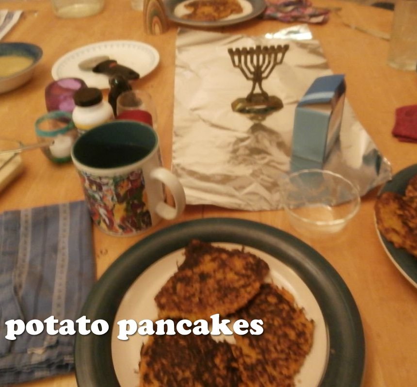 Chanukah table with potato pancakes