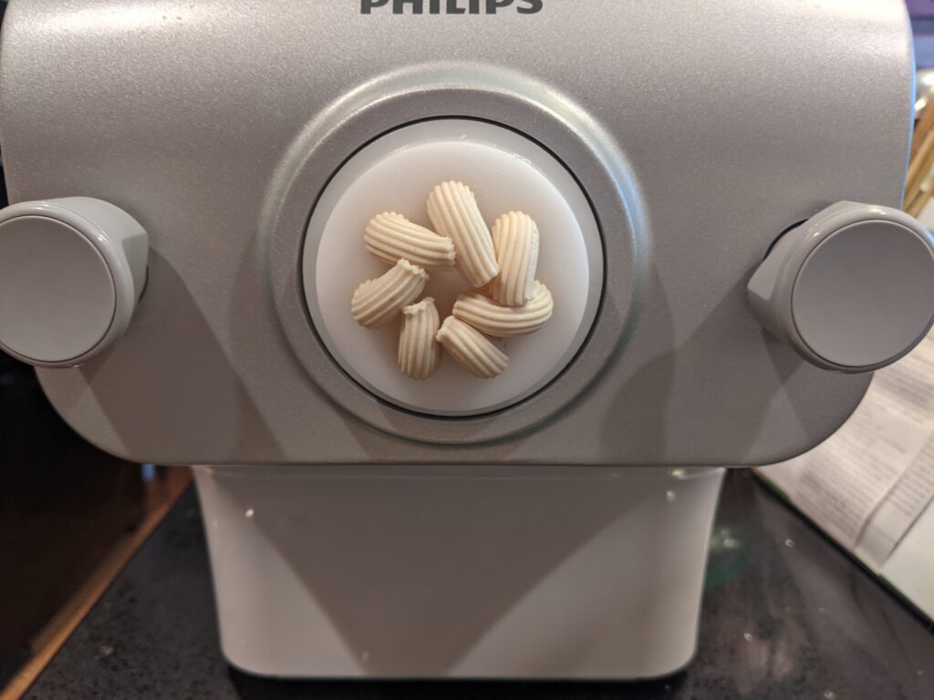 Pasta machine making penne