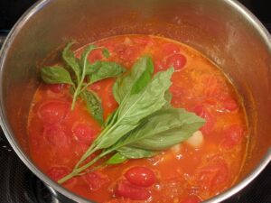 basil and garlic in tomato sauce