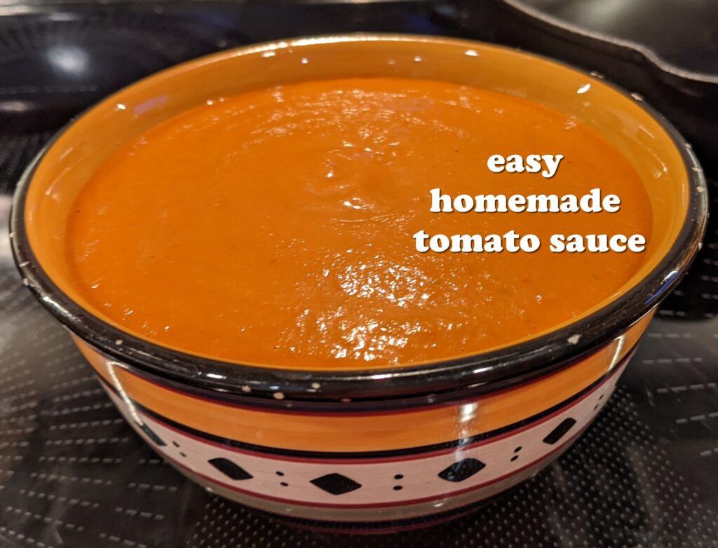Bowl of tomato sauce with the words Easy Homemade tomato Sauce