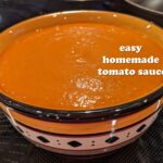 Bowl of tomato sauce with the words Easy Homemade tomato Sauce